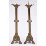 A pair of French gothic revival gilt lacquered brass pricket candlesticks, late 19th c, 59cm h