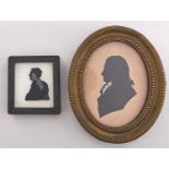 English Profilist, early 19th c - Silhouette of a Man, cut paper, heightened with white, oval, 12cm,