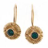 A pair of green paste earrings, in gold wire loop, marked 750, 1.4g Good condition