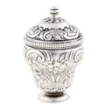 A George II pear shaped silver nutmeg grater, mid 18th c, the domed, threaded cover chased with