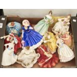 Twelve Royal Doulton bone china figures of young women, various subjects and sizes, printed marks As