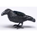 A cold painted bronze hatpin cushion in the form of a crow, c1900, 21cm l Re-painted but