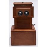 A French walnut stereoscope, Educa Unis, early 20th c, with pair of viewing lenses on a laterally