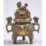 A Chinese brass tripod censer and cover, 19th / early 20th c, 14cm h Good condition, old polish