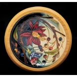 A Moorcroft Hartgring plate, early 21st c, 25cm diam, printed marks, framed Good condition, second