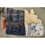 Sheepskin rugs, orange and brown kilim rug, Chinese blue wool rug, the field worked with deer,