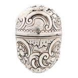 A George III egg shaped silver nutmeg grater, chased and engraved with c-scrolls and flowers,