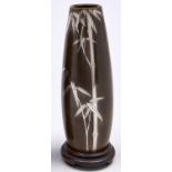 A Japanese silver inlaid bronze vase, Taisho period, decorated with bamboo, rubbed light brown