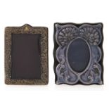 An Elizabeth II miniature silver photograph frame, 85mm h, London 1990 and another, of similar