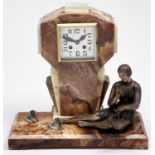 A French art deco bronzed spelter figural mounted onyx mantel clock, c1930, bell striking