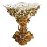 A German floral encrusted and reticulated porcelain fruit stand on associated ormolu foot, c1900,