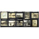 Photography. Fifteen 3¼ x 3¼" (six mounted larger) glass magic lantern slides of the Exposition