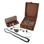 Miscellaneous silver jewellery and other articles in a leather jewel box and coins - United