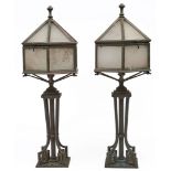 A pair of English Art Deco hexagonal bronze lanterns, c1930  the sides and hinged top with frosted