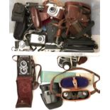 A quantity of vintage cameras and binoculars, to include Microcord MPP Gnome Pronto, Werra mat