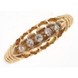 An Edwardian four stone diamond ring, in 18ct gold, Birmingham 1906, 2.9g, size M One of the smaller