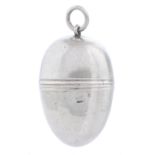 A George III egg shaped silver nutmeg grater, c1790, 41mm including attached ring but excluding