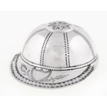 A George III silver jockey cap novelty caddy spoon,  realistically engraved, 48mm, maker IT,