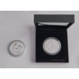 Silver Coins. United Kingdom proof £5 2008, cased and Britannia 2009, boxed