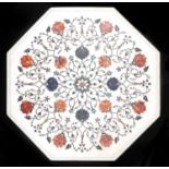 An Indian octagonal stone and mother of pearl inlaid marble table top, 20th c, in Mughal style, 49cm
