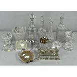 A collection of pressed glass decanters, inkwells and other glass,