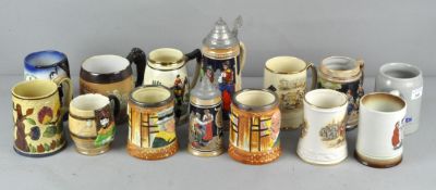 A collection of ceramic mugs and tankards to include a Doulton Lambeth stoneware tankard