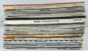 An assorted collection of LP records, including Stones, Beatles,along with mainly classical.