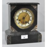 A Slate and marble mantle clock, with roman numerals on enamel denoting hours,