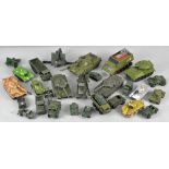 A collection of die cast model military vehicles, including examples by Dinky,