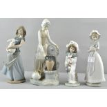 Four Nao female figures,