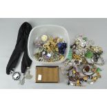 A collection of assorted Costume Jewellery to include brooches,