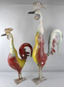 A pair of fabricated and painted metal chickens of comical form,