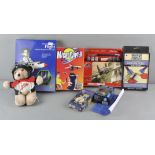 A collection of assorted toys and games, including an Airfix model aircraft kit,