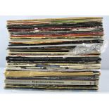 A collection of assorted vinyls, mostly rock, to include Fleetwood Mac, Mungo Jerry,