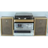 A Sanyo Hi Fi system with Garrard deck and speakers.