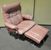 A revolving reclining chair with stool,