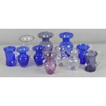 A mixed collection of assorted Sark Studio glass items, including vases and pouring vessels etc,