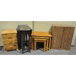 A nest of three tables, 65cm wide; a twin door cupboard,