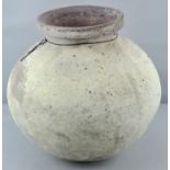 A large pottery vase/vessel of globular form with flared rim, lacking stand,