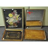 A collection of items to include two trays, a needlework flower picture and a mirror,