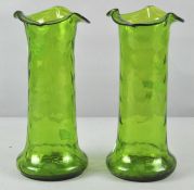 A pair of 19th century Art Nouveau green glass vases,