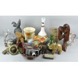 A collection of assorted mixed wares to include stone elephants, a lamp,