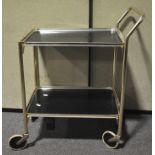 A vintage chrome two tier drinks trolley,