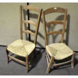 Two 20th century low wicker seated chairs, 101cm high,