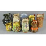 A collection of ceramic jugs to include; Arthur Wood, falcon ware and more,