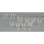 A collection of Eight Waterford crystal glass wine glasses with bubble like detailing, largest 16.