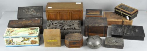 A collection of wooden and tin boxes to include a coffer shaped box,