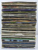 A large collection of assorted vinyls,