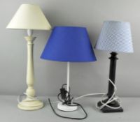 Two metal table lamps and a panted turned wood lamp.