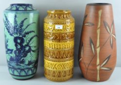 A collection of three assorted retro vintage West German pottery floor vases,